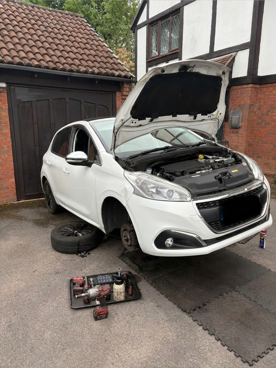 Mobile clutch replacement in Essex being carried out on a car at the customer's home by a Mobile Clutch Repair Essex technician